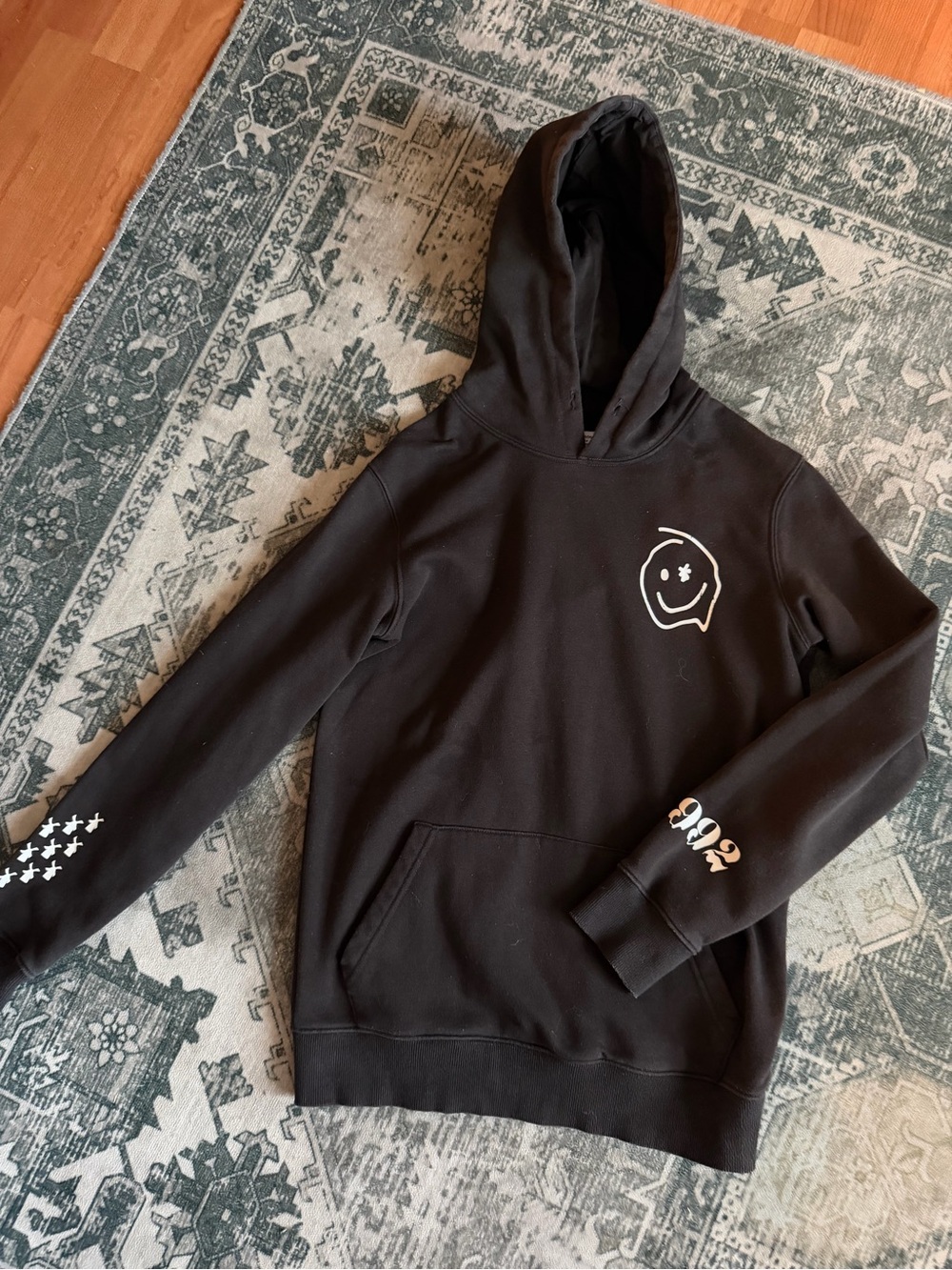 Dutch Bros Coffee hoodie white smiley face on chest 1992" on the sleeve size S